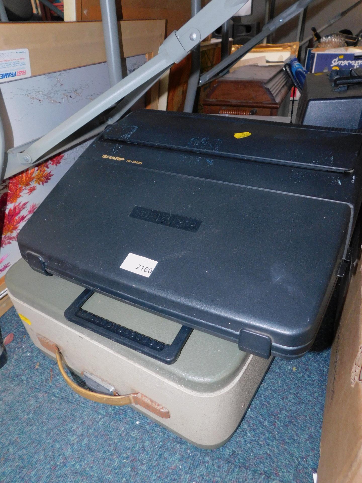 A Sharp PA-3140S typewriter, an Acoustic Solutions hi-fi micro system, and two other cased typewrite