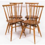 A set of four 1960's elm seated beech stick back kitchen chairs, stamped BS1960/HH2056.