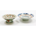 A Chinese Swatow porcelain stem bowl, decorated with a concentric design of flower heads and leaves