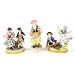 Three porcelain figure groups, to include a girl and boy on a seesaw, a girl and boy dancing, unmark