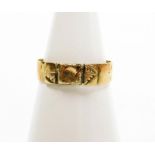 A 9ct gold buckle ring, ring size P½, generally worn and rubbed, 1.6g.