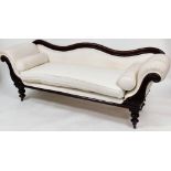 A Victorian mahogany framed sofa, with serpentine shaped moulded back, with carved scrolling arms on