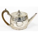 A William IV oval silver teapot, with acorn finial top with circular vacant crest, London 1832, 15oz