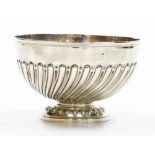 A Victorian silver punch bowl, with a wrythen body, on a stepped foot rim, London 1891, 11cm high, 1