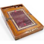 A figured walnut campaign writing box, with brass inlay and a red leather inset interior, 16cm high,