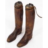 A set of brown leather riding boots and wooden trees, stamped Maxwell, Dover Street, London, 52cm hi