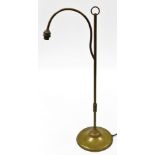 A brass table lamp, with arched pedestal on column support, 70cm high.