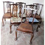 A set of six Chippendale style mahogany dining chairs, each with upholstered seat in varying materia
