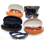 A group of sunglasses, to include Guess, Ralph Lauren, Oakley and Tommy Hilfiger. (5, AF)