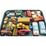 A group of playworn die cast cars, farming vehicles, tin plate saloon cars, etc. (a quantity)