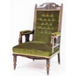 An Edwardian beech ladies salon chair, with a carved back and green draylon upholstery, 110cm high,