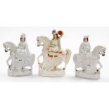 Three 19thC Staffordshire flat back figures, to include a pair of figures on horseback, 24cm high, a