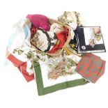 A group of silk scarves, to include some examples by Hermes, Christian Dior, and others. (a quantity