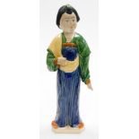 A Chinese terracotta glazed Tang style figure of a woman, in long blue, green, yellow and brown robe