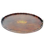 A 19thC mahogany Sheraton design oval serving tray, the centre with marquetry navette of a swan, (AF