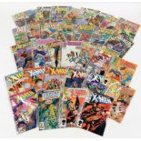 A group of Avengers and X Men comics.