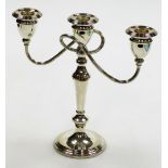 A Christian Dior silver plated two branch candelabrum, of Neo Classical design, 25cm high.