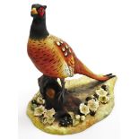 A Royal Crown Derby figure of a pheasant, 27cm high.