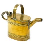 A Victorian brass watering can, 24cm high, 31cm wide.