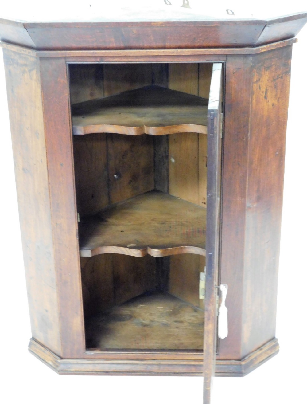 A George III oak corner cabinet, with two panelled door on moulded cornice, with brass key plate, 10 - Image 2 of 2