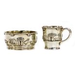 A George V silver christening set, with bowl and tankard, each decorated with Noah's Ark figures, st