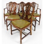 A set of six mahogany dining chairs, with Prince of Wales feather splats and green leather drop in s