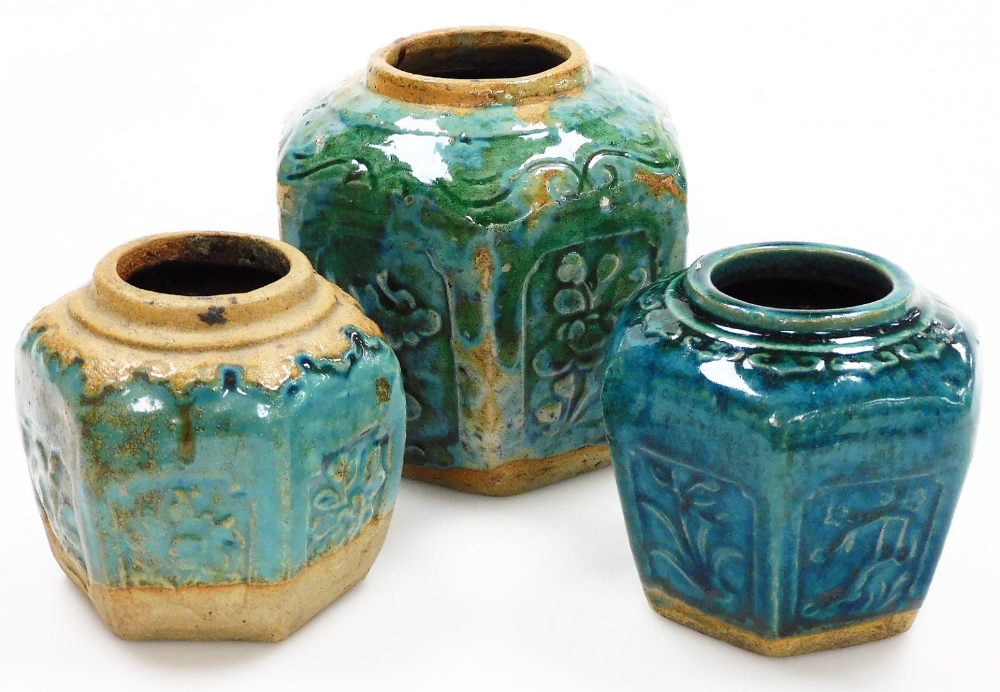 Three Chinese stoneware hexagonal ginger jars, each with a turquoise glaze, 13cm high, and two 10cm