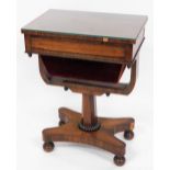A Victorian rosewood sewing table, with side slide drawer and red velvet draw bag on a quatrefoil ba