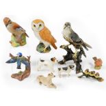 A group of various animal ornaments, to include a Capodimonte figure of three birds on a branch, an