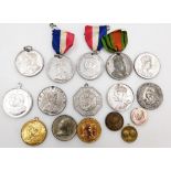 A group of medals, to include The George V and Queen Mary commemorative medallion, The 1937 Westmins