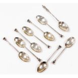 Eight George V silver teaspoons, comprising two sets of four, each with seal tops bearing the initia