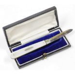 A cased silver and mother of pearl handled pen knife, the mother of pearl handle with oval shield, t