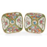 A pair of 19thC Chinese Canton porcelain square dishes, decorated with opposing panels of court scen