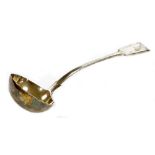 A Victorian silver fiddle pattern serving ladle, with arched handle and bearing crest for the Fillin