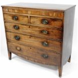 A 19thC mahogany secretaire chest, of two short and three long drawers with oval brass handles, on s