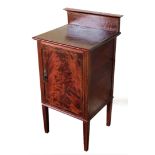 A Victorian mahogany pot cupboard, with string inlay detail on the legs and door, on taper legs, 82c