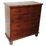 A Victorian mahogany chest, of two short and three long drawers, each with knob handles, on bun feet