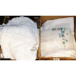 A group of linen, dollies, tablecloths, etc. some embroidered. (2 boxes)