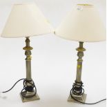 A pair of silvered finished Corinthian column table lamps, with single shade.