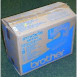 A Innovis CS8120 sewing machine, boxed.