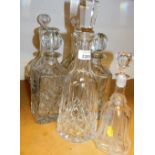 Eight cut and pressed glass decanters, mainly square set with some mallet shaped decanters. (a quan