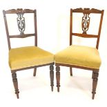 A pair of late 19thC walnut side chairs, each with a pierced splat and a padded seat on turned taper