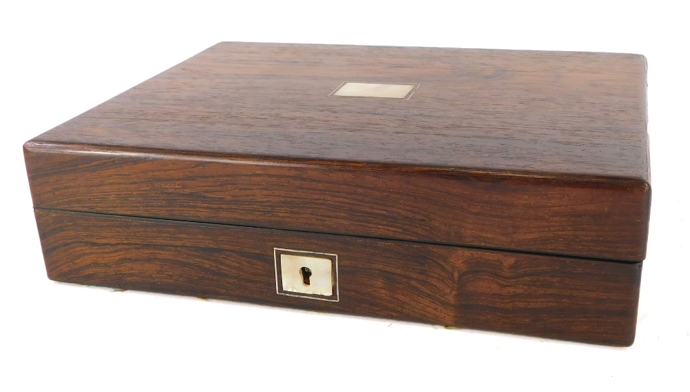 A Victorian and later rosewood writing box, the top with a vacant rectangular mother of pearl cartou