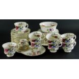 A Royal Albert Flowers of The Month March pattern part service, to include miniature cups and saucer