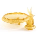 A mid 20thC Art Deco glass centrepiece, in amber glass, formed as bird, on removable flower holder b