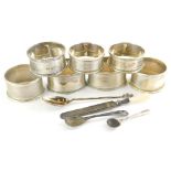 A collection of small silver, to include various napkin rings, some with engine turned decoration, t