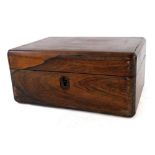 A Victorian and later rosewood workbox, the hinged lid inlaid in mother of pearl, enclosing a partia