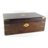 A 19thC and later rosewood campaign writing box, of rectangular form, with flush handles and brass d