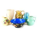 A collection of ceramics, to include Beswick brown glazed jug, Indian Tree Woods jugs, etc.