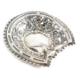 A Victorian silver sweetmeat dish, in the form of a horseshoe, with pierced decoration and embossed